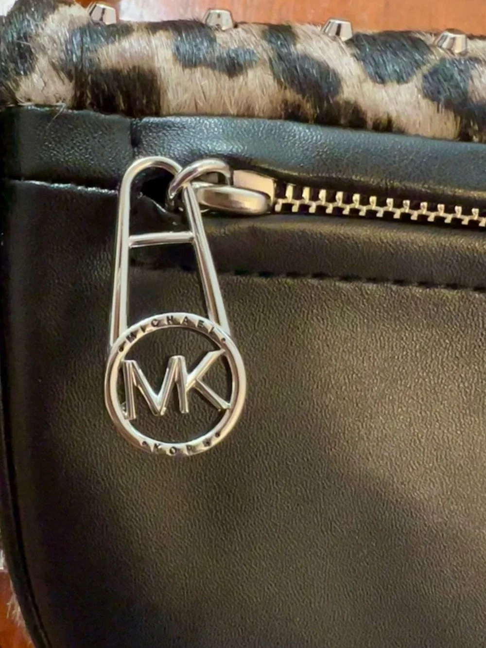 Michael Kors animal print calf hair cross body adjustable Sling Pack